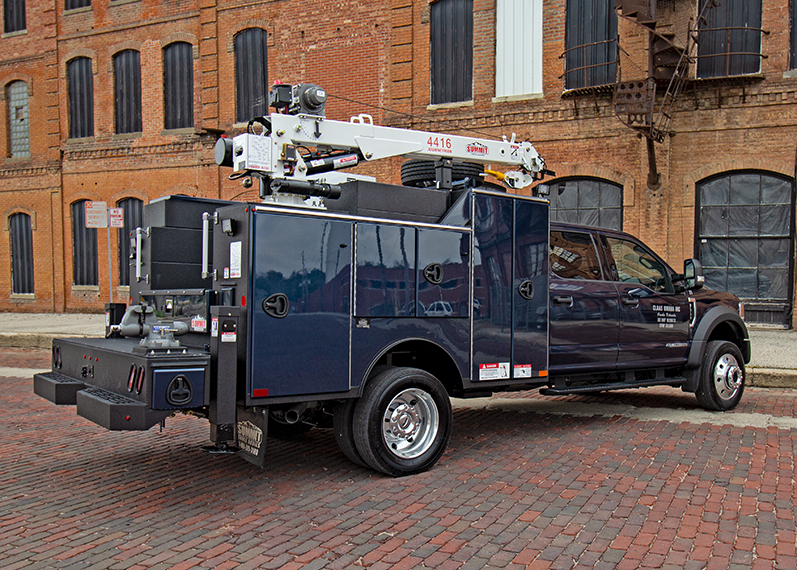 blue service truck with electric crane