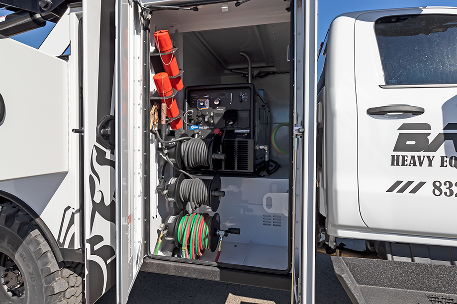 service truck tool storage ideas: welder storage compartment