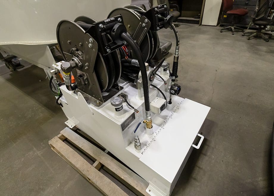 hannay reels mounted on top of electric lube skid