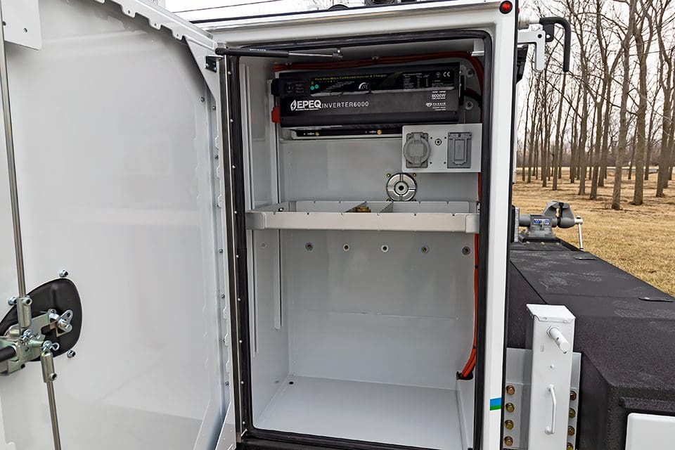 effiently oraganized truck body with inverter mounted inside compartment.